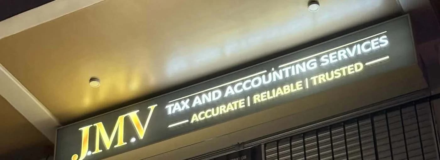 J.M.V Tax and Accounting Services storefront signage